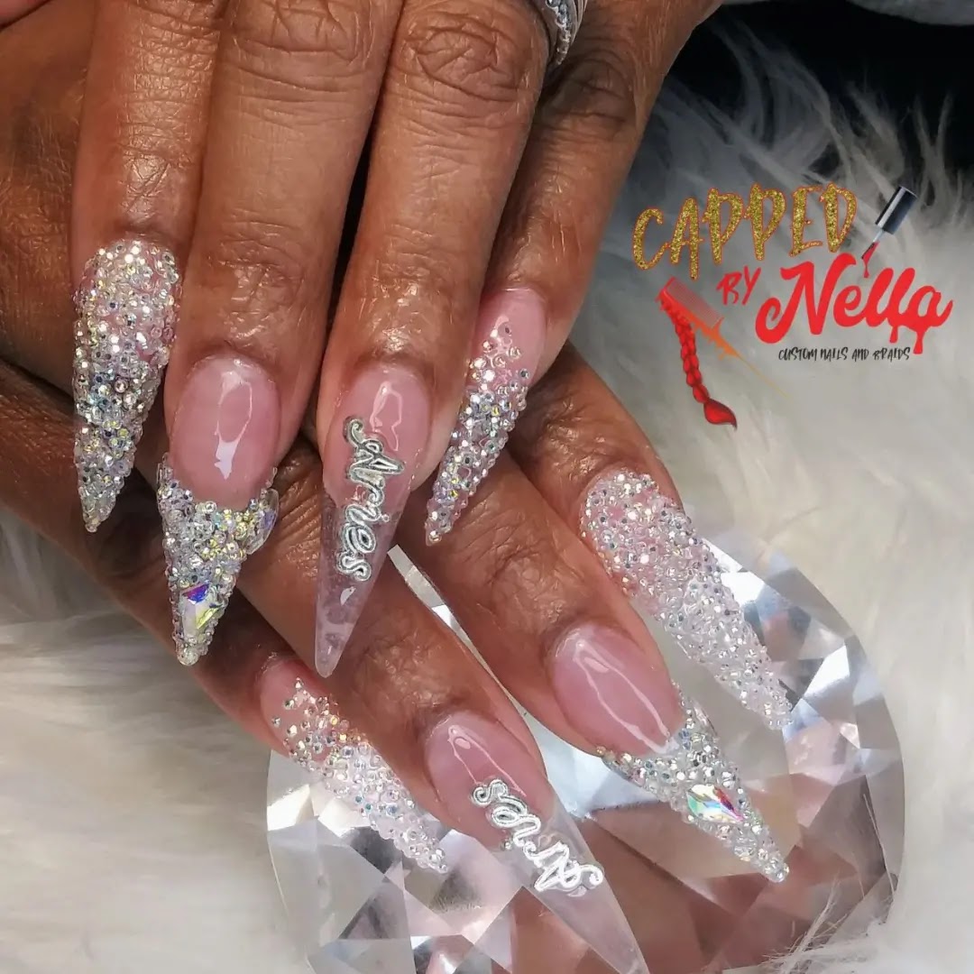 Capped Nails logo
